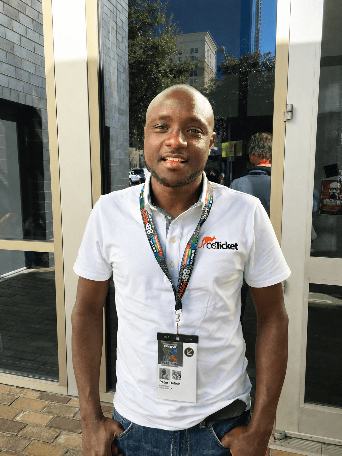 A younger Peter Rotich wearing an osTicket shirt at SXSW